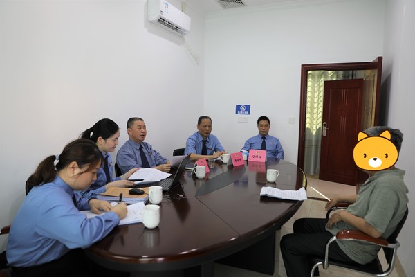 彭检约谈罗国钢4.13.JPG